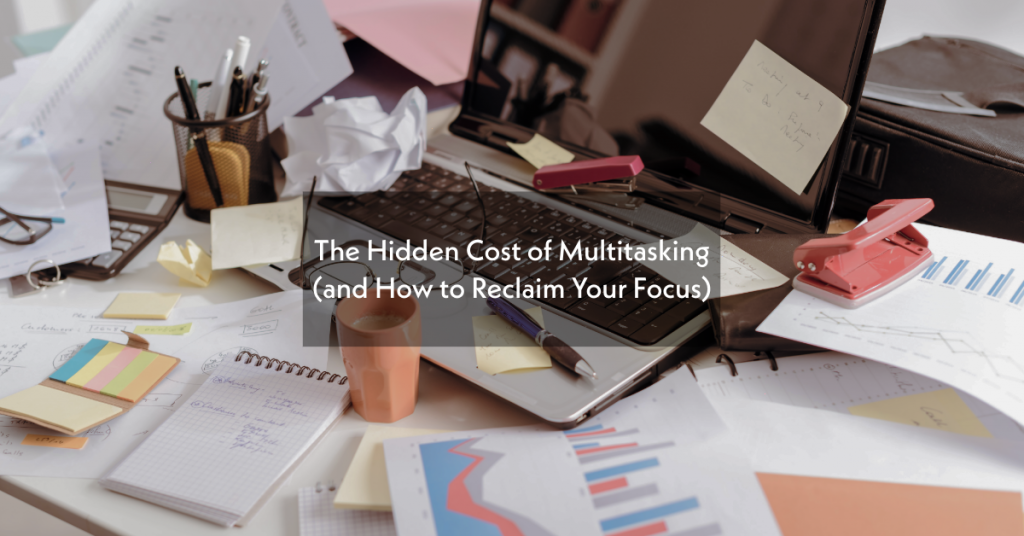 Cluttered desk representing multitasking and distraction